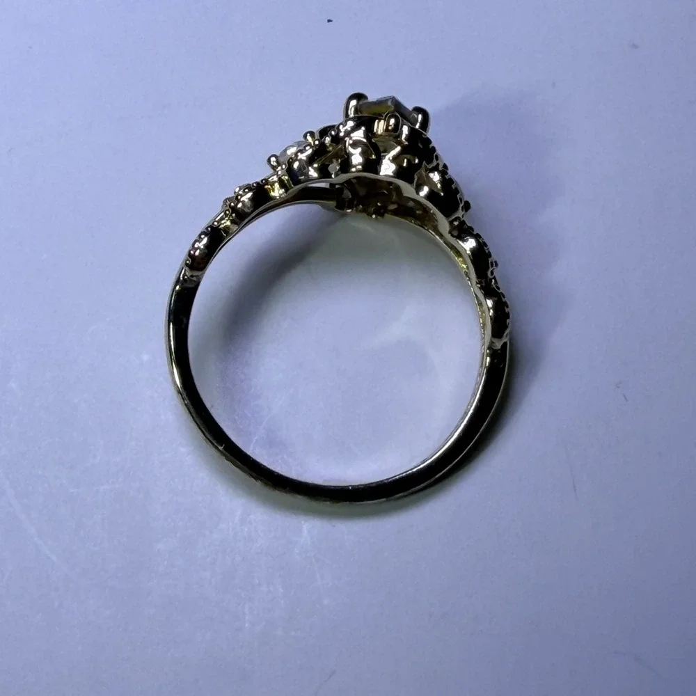 Fragrant Jewels Gold Tone Marquise Iridescent Stone Filigree Bow Ring Size 8.25